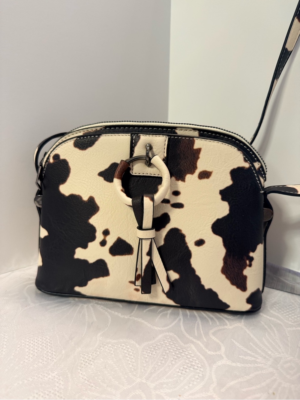 Cowhide-Pattern Crossbody Bag in Black & Cream with Ring Accent